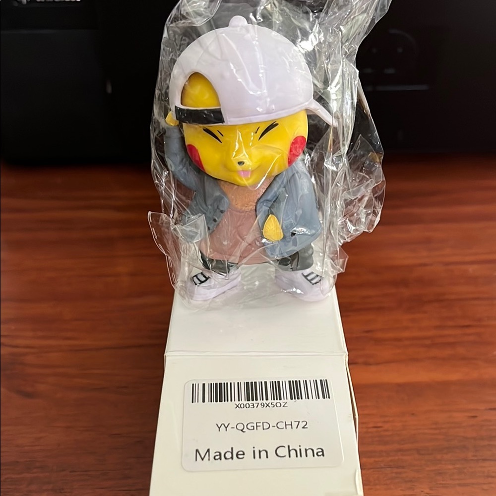 Hip Hop Style Figurine with Cap